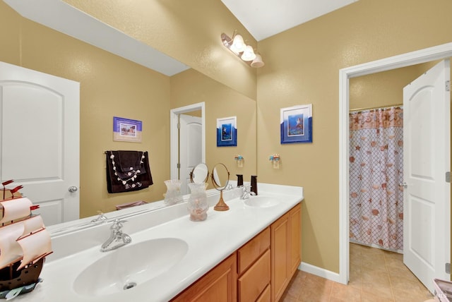 644 Canterbury Cir, Vacaville, CA 95687 - bathroom featuring double vanity, tile patterned floors, and curtained shower