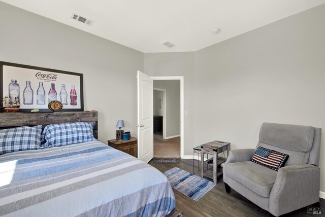 644 Canterbury Cir, Vacaville, CA 95687 - bedroom featuring dark wood-style floors and baseboards