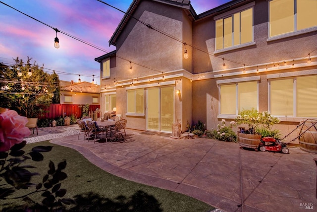 644 Canterbury Cir, Vacaville, CA 95687 - rear view of property with stucco siding and a patio area