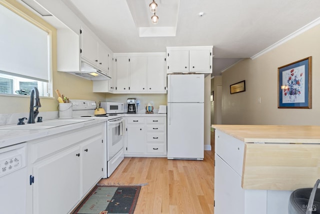 7771 Healdsburg Ave Unit 22, Sebastopol, CA 95472 - kitchen featuring white appliances, light wood-type flooring, light countertops, white cabinetry, and under cabinet range hood