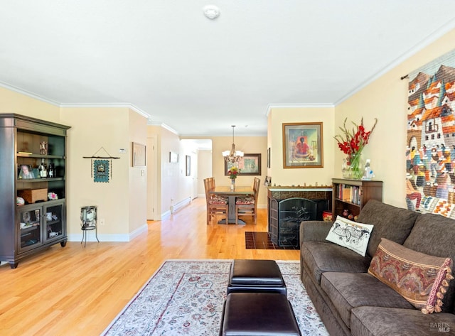 7771 Healdsburg Ave Unit 22, Sebastopol, CA 95472 - living area with light wood finished floors, a chandelier, and ornamental molding