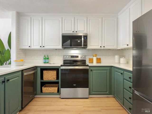 15 Sulgrave Ln, San Rafael, CA 94901 - kitchen with stainless steel appliances, green cabinets, white cabinets, and tasteful backsplash