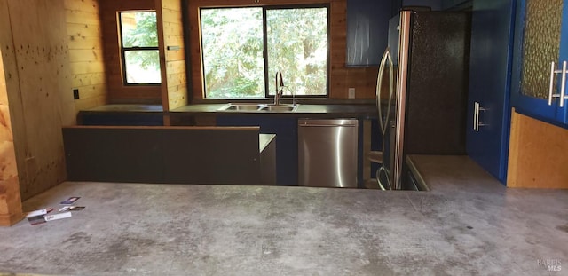 24663 Clover Rd, Willits, CA 95490 - kitchen with appliances with stainless steel finishes and wood walls