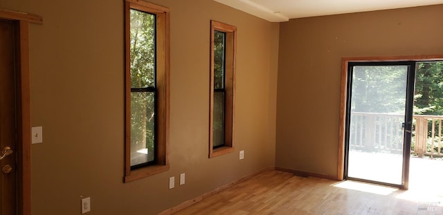 24663 Clover Rd, Willits, CA 95490 - empty room with plenty of natural light and light wood finished floors