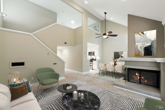 4 Cielo Ln Unit 3E, Novato, CA 94949 - living area featuring vaulted ceiling, light colored carpet, ceiling fan, a glass covered fireplace, and recessed lighting