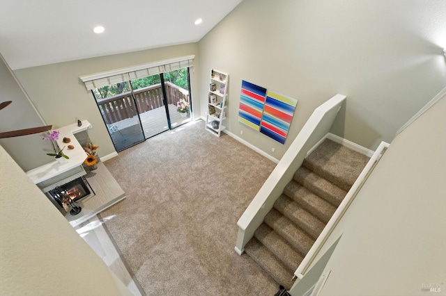 4 Cielo Ln Unit 3E, Novato, CA 94949 - staircase featuring carpet flooring, a glass covered fireplace, and recessed lighting