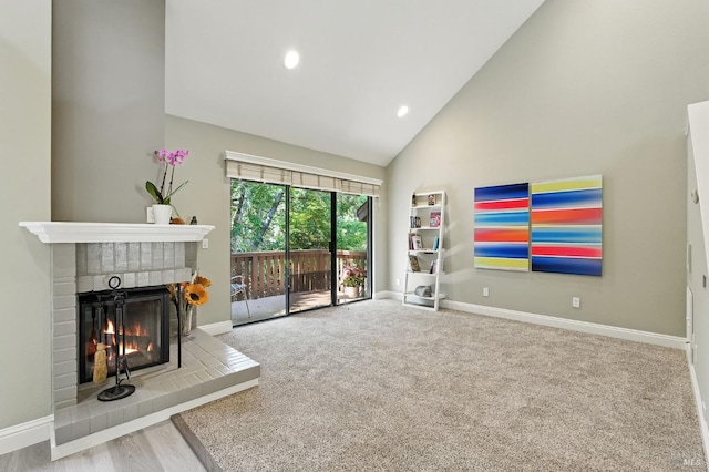 4 Cielo Ln Unit 3E, Novato, CA 94949 - carpeted living room featuring a fireplace, high vaulted ceiling, and recessed lighting