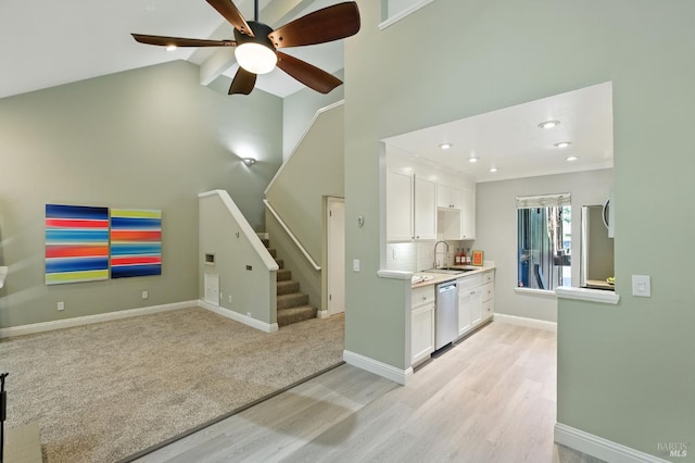 4 Cielo Ln Unit 3E, Novato, CA 94949 - kitchen featuring stainless steel dishwasher, light wood-style floors, light countertops, white cabinetry, and a ceiling fan