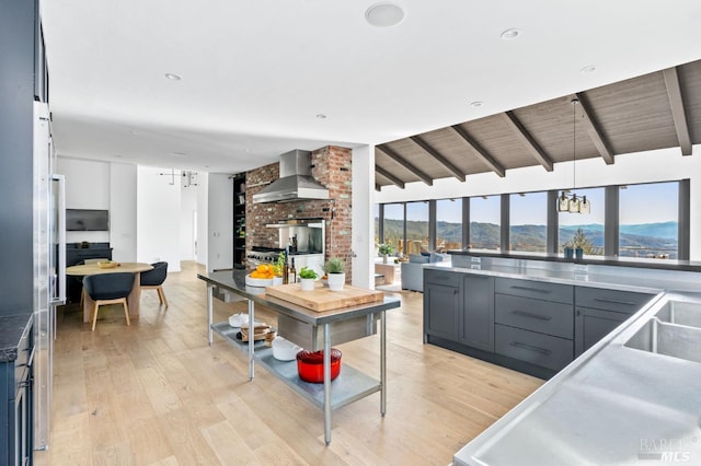 1325 Crestmont Dr, Angwin, CA 94508 - kitchen featuring wall chimney range hood, light wood finished floors, a mountain view, and wooden ceiling