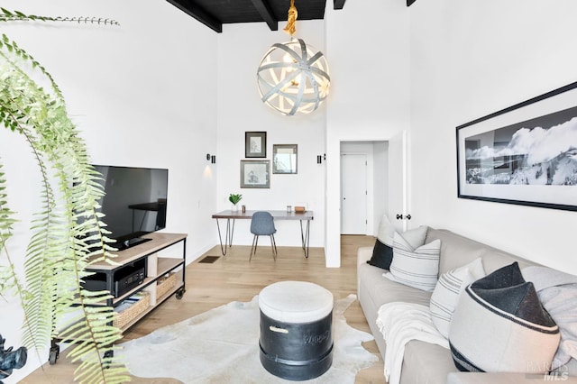 1325 Crestmont Dr, Angwin, CA 94508 - living area with wood finished floors, a towering ceiling, a desk, and beam ceiling