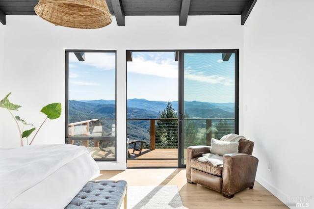 1325 Crestmont Dr, Angwin, CA 94508 - bedroom featuring a mountain view, wood finished floors, access to outside, and a wood ceiling with exposed beams