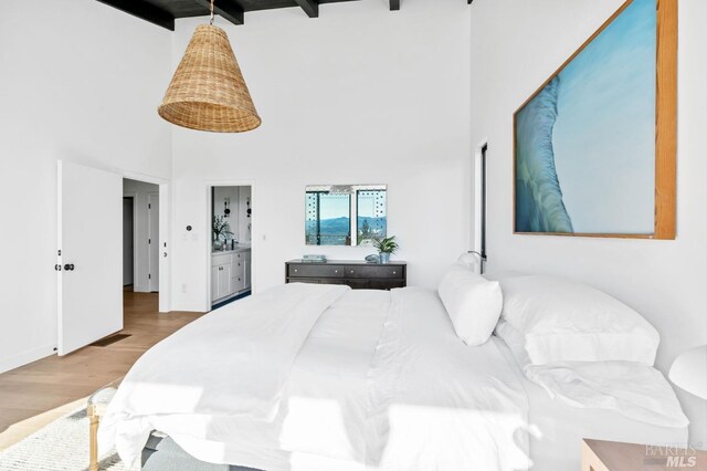 1325 Crestmont Dr, Angwin, CA 94508 - bedroom with a towering ceiling, wood finished floors, and beamed ceiling