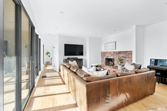 1325 Crestmont Dr, Angwin, CA 94508 - living area with light wood-style floors and a brick fireplace