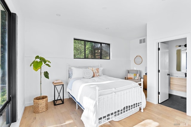 1325 Crestmont Dr, Angwin, CA 94508 - bedroom with multiple windows and wood finished floors