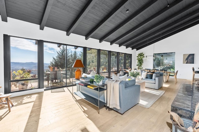 1325 Crestmont Dr, Angwin, CA 94508 - living area with wood finished floors, high vaulted ceiling, a wooden ceiling with exposed beams, and a mountain view