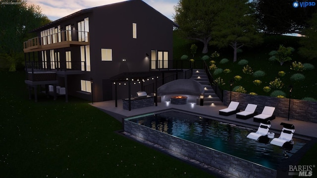 1325 Crestmont Dr, Angwin, CA 94508 - back of property at dusk featuring a patio area, stairs, a balcony, and a yard
