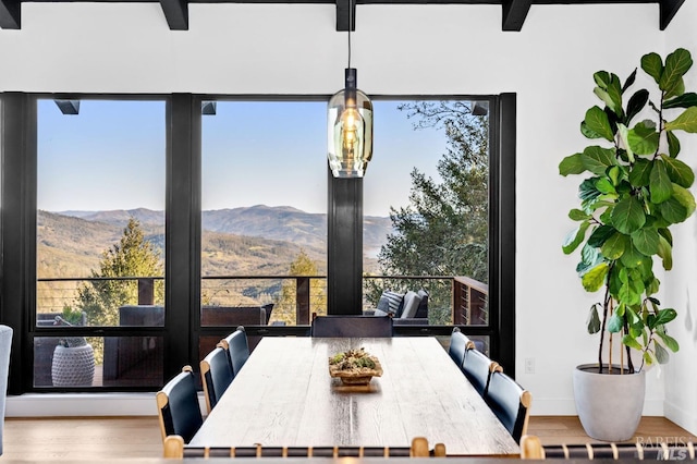 1325 Crestmont Dr, Angwin, CA 94508 - dining space featuring a mountain view, wood finished floors, and plenty of natural light
