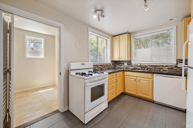 711 San Anselmo Ave, San Anselmo, CA 94960 - kitchen with white appliances, light brown cabinets, dark countertops, and tasteful backsplash