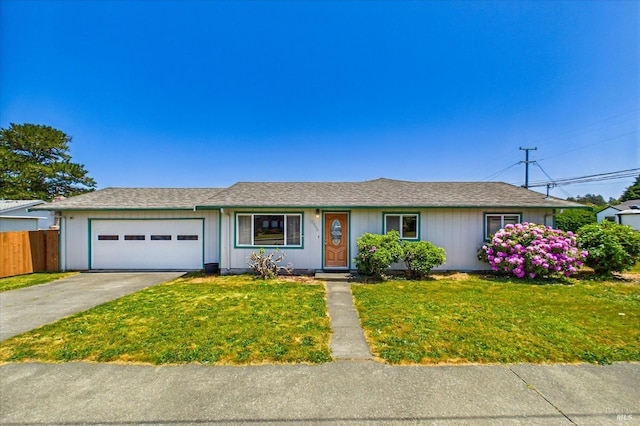 2393 Ohio St, Eureka, CA 95501 - ranch-style house with concrete driveway and an attached garage