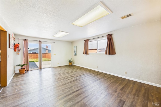 2393 Ohio St, Eureka, CA 95501 - empty room featuring wood finished floors and a textured ceiling