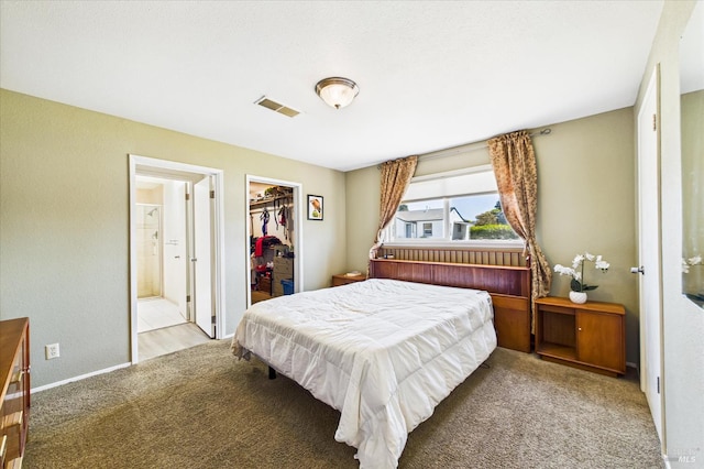 2393 Ohio St, Eureka, CA 95501 - carpeted bedroom featuring a walk in closet, a closet, and ensuite bathroom