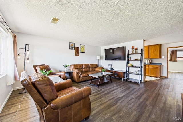 2393 Ohio St, Eureka, CA 95501 - living area featuring a textured ceiling and dark wood finished floors