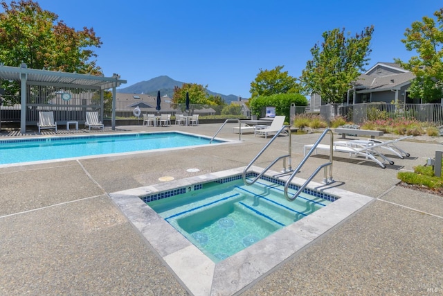 1 Drakes View Cir, Greenbrae, CA 94904 - community pool featuring a hot tub, a mountain view, and a patio area