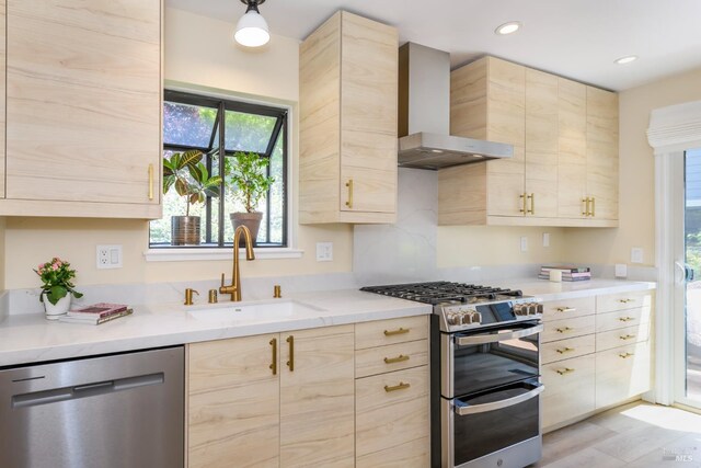 1 Drakes View Cir, Greenbrae, CA 94904 - kitchen with stainless steel appliances, wall chimney exhaust hood, light brown cabinets, and recessed lighting