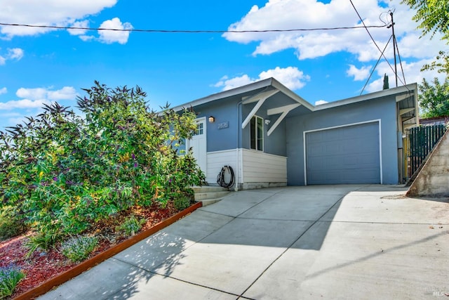 2876 Hilltop Rd, Concord, CA 94520 - view of front of property featuring driveway, a garage, and stucco siding
