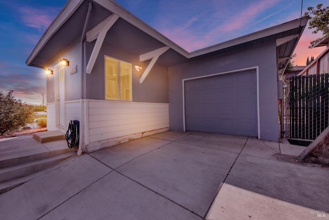 2876 Hilltop Rd, Concord, CA 94520 - view of front facade with driveway, a garage, and stucco siding