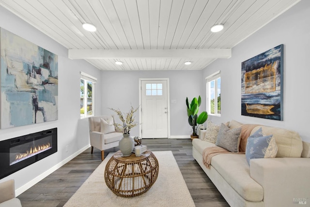 2876 Hilltop Rd, Concord, CA 94520 - living room with healthy amount of natural light, a glass covered fireplace, recessed lighting, dark wood finished floors, and a wooden ceiling with exposed beams