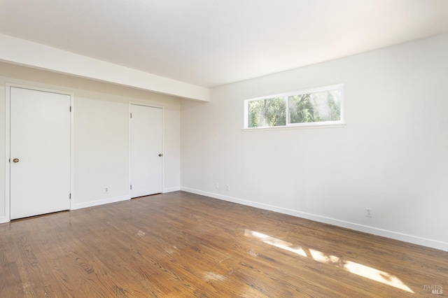 23 Hillside Dr, Fairfax, CA 94930 - unfurnished bedroom with baseboards and wood finished floors