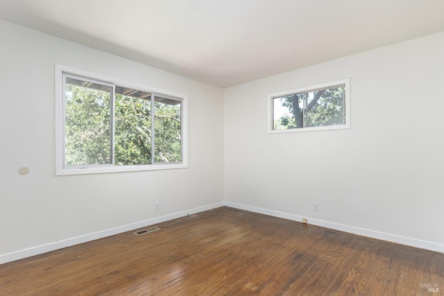 23 Hillside Dr, Fairfax, CA 94930 - empty room with plenty of natural light and dark wood-style floors