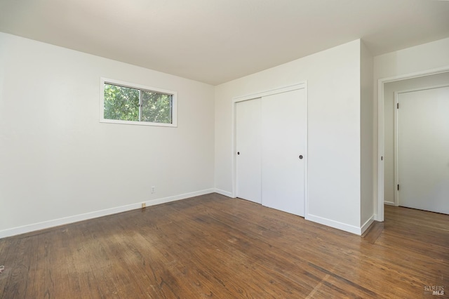 23 Hillside Dr, Fairfax, CA 94930 - unfurnished bedroom featuring a closet and dark wood finished floors