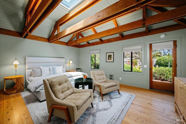 11 Walla Vis, Stinson Beach, CA 94970 - bedroom with access to exterior, light wood-style flooring, and a skylight