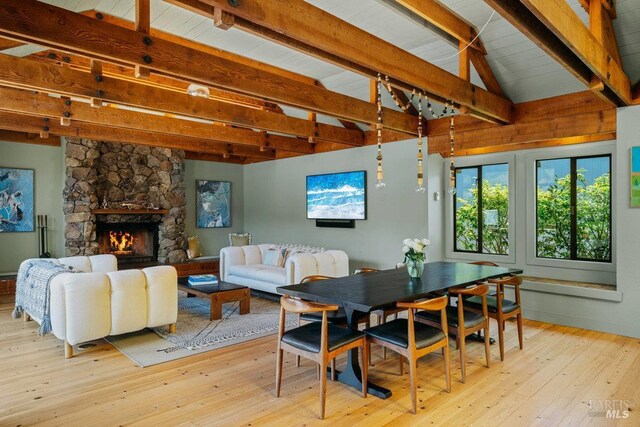 11 Walla Vis, Stinson Beach, CA 94970 - dining space featuring hardwood / wood-style flooring and a fireplace