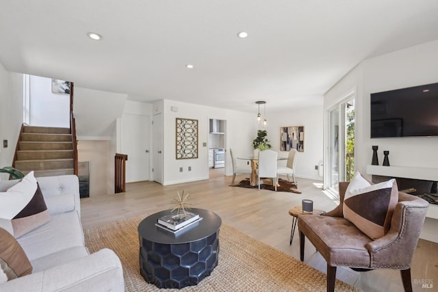 14 Corte Real Ct, Greenbrae, CA 94904 - living area featuring light wood finished floors, stairs, and recessed lighting