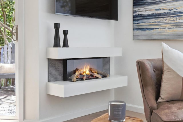 14 Corte Real Ct, Greenbrae, CA 94904 - detailed view of wood finished floors and a warm lit fireplace