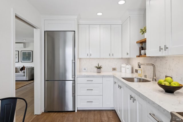 14 Corte Real Ct, Greenbrae, CA 94904 - kitchen featuring stainless steel refrigerator, open shelves, white cabinets, decorative backsplash, and recessed lighting