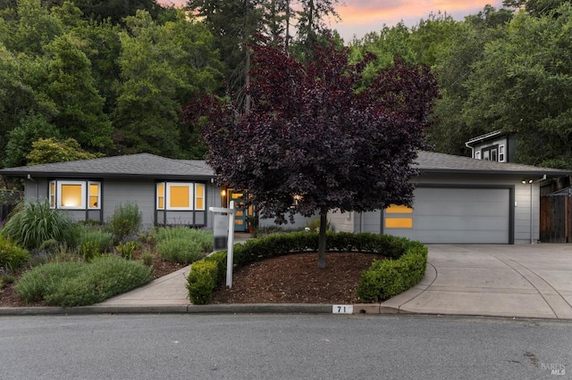 71 Convent Ct, San Rafael, CA 94901 - view of front of property featuring concrete driveway, a garage, and roof with shingles