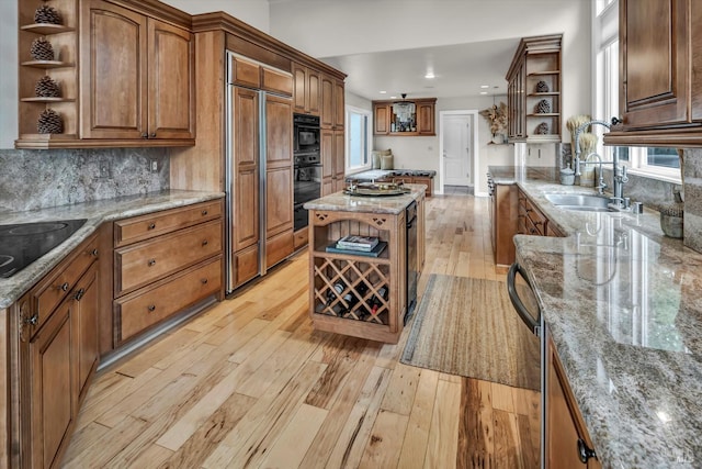 18903 N Shore Dr, Hidden Valley Lake, CA 95467 - kitchen featuring open shelves, light wood finished floors, recessed lighting, light stone counters, and decorative backsplash
