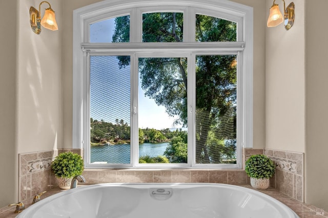 18903 N Shore Dr, Hidden Valley Lake, CA 95467 - full bath featuring a tub with jets, a water view, and healthy amount of natural light
