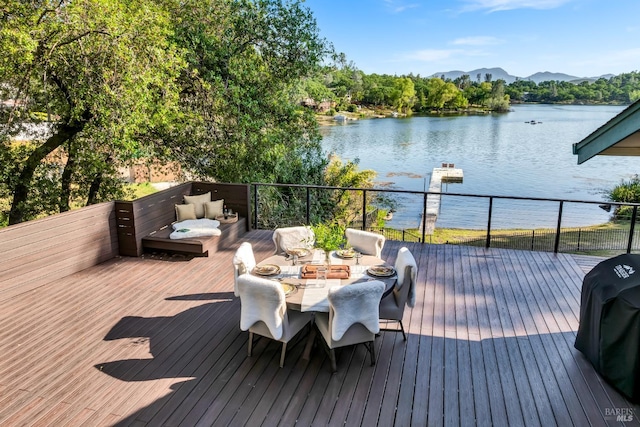 18903 N Shore Dr, Hidden Valley Lake, CA 95467 - wooden deck with a water and mountain view, area for grilling, and outdoor dining area