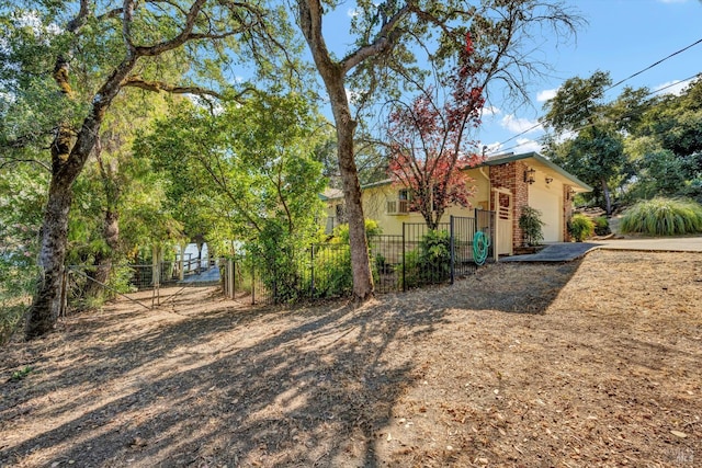 18903 N Shore Dr, Hidden Valley Lake, CA 95467 - view of front of house with an attached garage and a gate