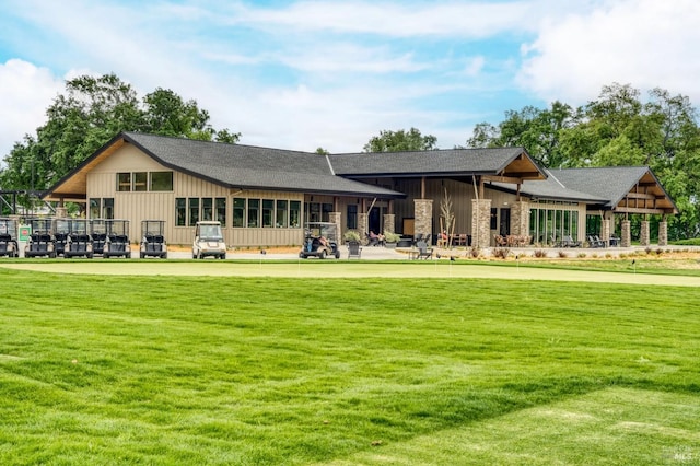 18903 N Shore Dr, Hidden Valley Lake, CA 95467 - back of house featuring a yard, board and batten siding, and a shingled roof