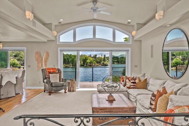 18903 N Shore Dr, Hidden Valley Lake, CA 95467 - carpeted living room featuring a water view, a ceiling fan, recessed lighting, wood finished floors, and lofted ceiling