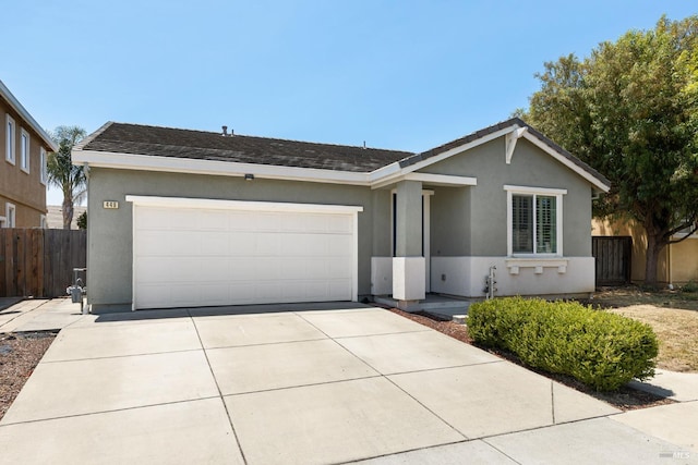 448 Potters Ln, Vacaville, CA 95687 - ranch-style house with driveway, an attached garage, and stucco siding