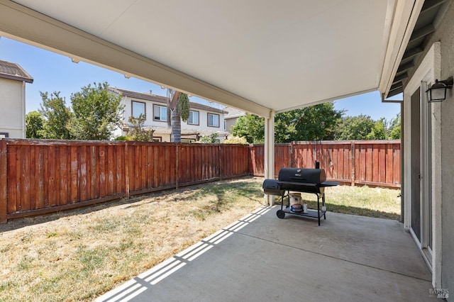 448 Potters Ln, Vacaville, CA 95687 - fenced backyard featuring grilling area and a patio