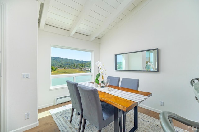 495 S Eliseo Dr Unit 7, Greenbrae, CA 94904 - dining space with a baseboard heating unit, wood finished floors, and wood ceiling