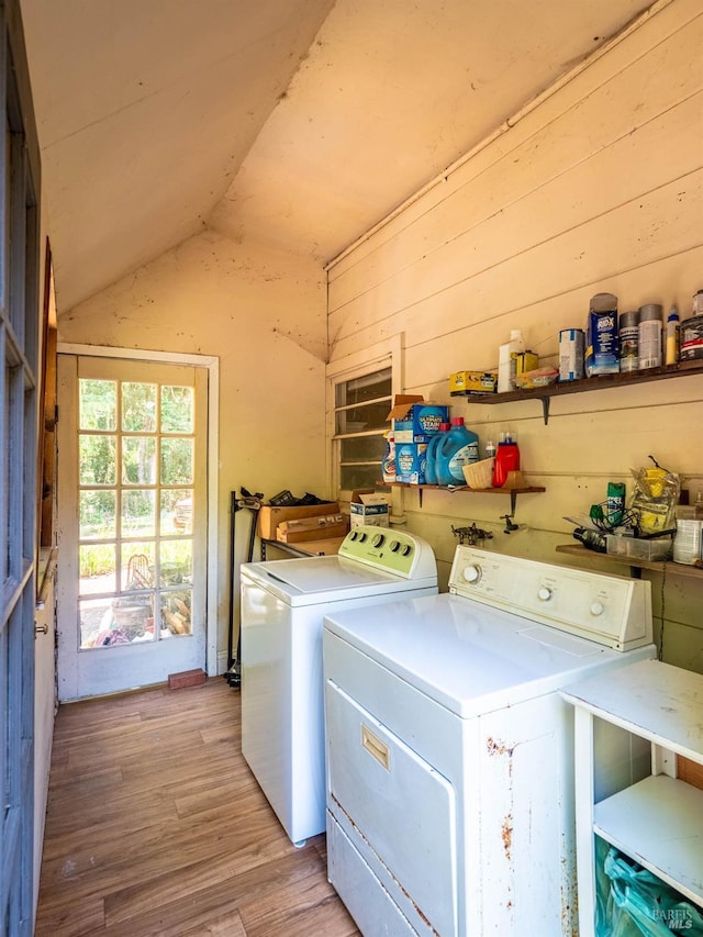5820 Ruddock Rd N, Philo, CA 95466 - laundry room featuring washer and dryer, light wood-type flooring, and wood walls